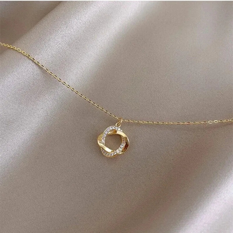 The 14k Gold Rotating Cross Pendant Necklace