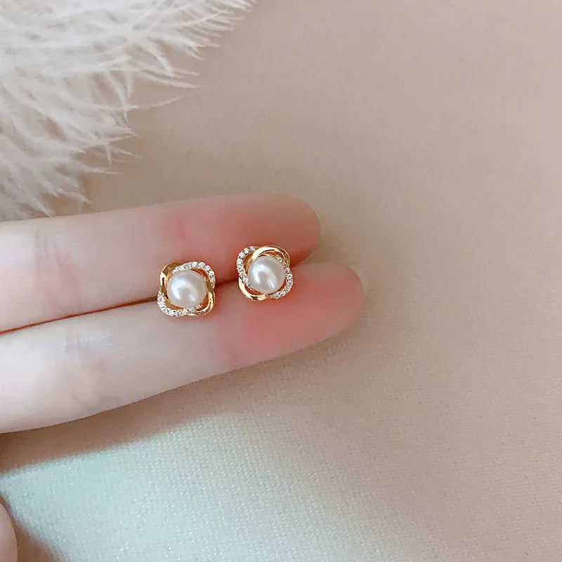 The 14k Gold Pearl Twist Studs