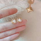 The 14k Gold Pearl Twist Studs