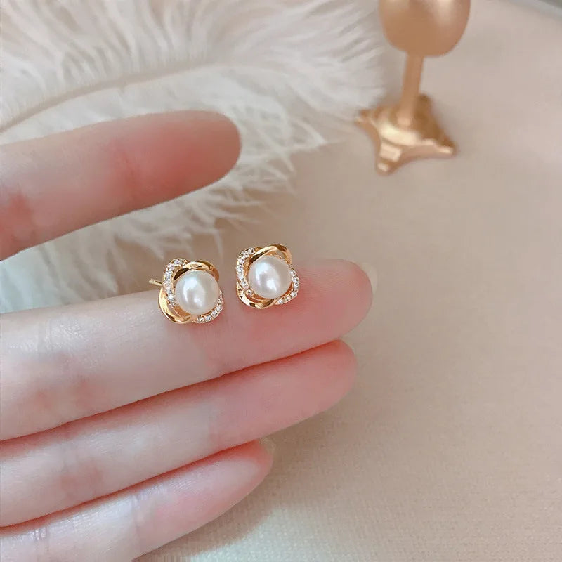 The 14k Gold Pearl Twist Studs