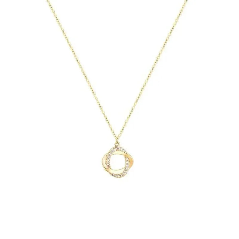 The 14k Gold Rotating Cross Pendant Necklace